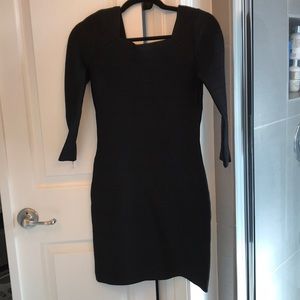 Classic black cocktail dress. Sure to turn heads!